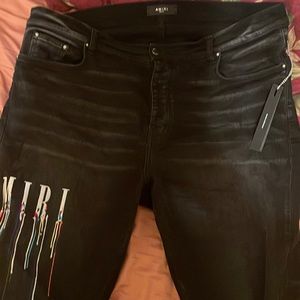 Amiri paint drop logo